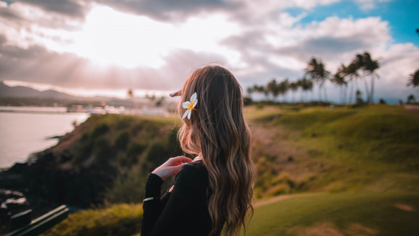 Beautiful girl in the hawaiian landscape