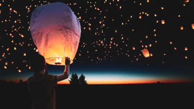Lanterns floating on the night sky