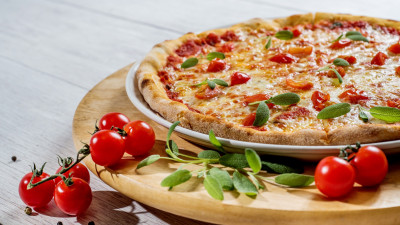 Pizza with cheese and tomatoes