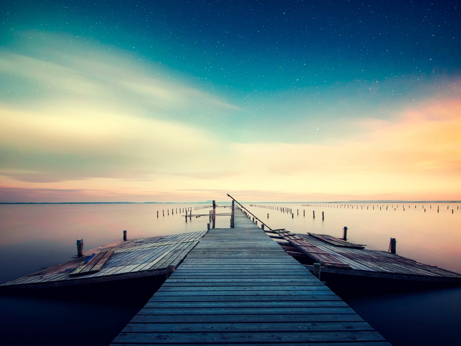 Admiring the night sky on the lake promenade wallpaper 1280x960